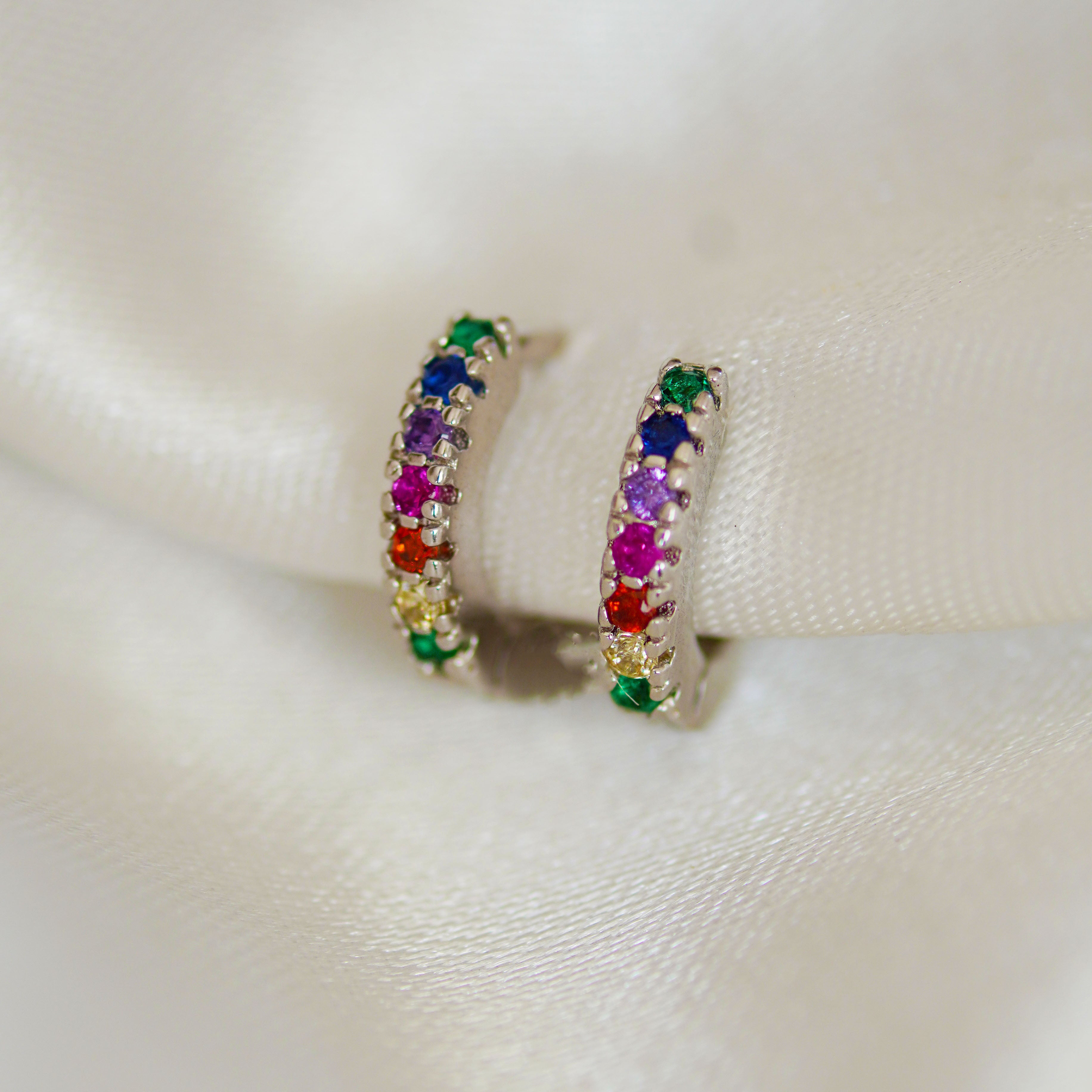 Silver rainbow huggie deals earrings